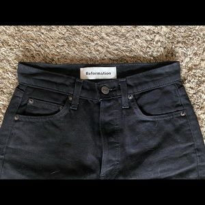 Reformation black skinny jeans.